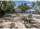 Inviting community pool with ample seating and a picnic area for relaxation and socializing at 945 Hamilton Ct, Palm Harbor, FL 34683