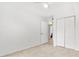 Neutral bedroom with tile flooring and standard closet at 9481 Highland Oak Dr # 212, Tampa, FL 33647