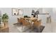 Staged dining area featuring a dining table with seating for six, perfect for entertaining at 9481 Highland Oak Dr # 212, Tampa, FL 33647