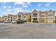Apartment complex with assigned parking, stairs to 2nd story units at 9481 Highland Oak Dr # 212, Tampa, FL 33647