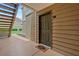 View of front door entrance with welcome mat and unit number 212 at 9481 Highland Oak Dr # 212, Tampa, FL 33647