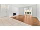 Bright living room featuring fireplace, tile floors, and view to back patio at 9481 Highland Oak Dr # 212, Tampa, FL 33647