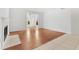 Bright living room with hardwood floors, fireplace, and large windows at 9481 Highland Oak Dr # 212, Tampa, FL 33647
