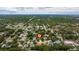 An expansive aerial view of the neighborhood, showcasing the home's prime location and community setting at 10053 W Bay St, Seminole, FL 33776