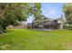 Enjoy a private backyard oasis with a screened-in pool perfect for relaxation and entertaining at 10053 W Bay St, Seminole, FL 33776