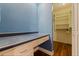 Built in desk area with a closet. Wood floors throughout at 10053 W Bay St, Seminole, FL 33776