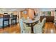 Open concept dining area with access to the living room and kitchen at 10053 W Bay St, Seminole, FL 33776