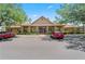 Charming clubhouse featuring manicured landscaping, ample parking, and a welcoming entrance for residents at 10520 White Lake Ct # 10520, Tampa, FL 33626