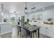 Elegant dining area featuring modern furnishings, stylish decor and a seamless open concept to the kitchen at 10520 White Lake Ct # 10520, Tampa, FL 33626