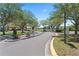 Community entrance with gated access and lush landscaping, offering security and curb appeal for residents at 10520 White Lake Ct # 10520, Tampa, FL 33626