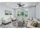 Serene living room featuring modern furnishings, natural light, and neutral tones for a calming atmosphere at 10520 White Lake Ct # 10520, Tampa, FL 33626