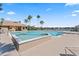 Community pool featuring a hot tub, lounge chairs and clubhouse, perfect for relaxation and socializing at 10520 White Lake Ct # 10520, Tampa, FL 33626