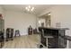 Stylish bar area with seating, ideal for hosting gatherings and enjoying drinks at 12451 Nouveau Ave, Spring Hill, FL 34610