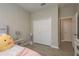 Bright bedroom with closet and plush decor at 12451 Nouveau Ave, Spring Hill, FL 34610