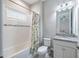 Clean bathroom featuring modern vanity, granite countertop, updated fixtures, shower and tub combo at 12652 Shetland Walk Dr, Lithia, FL 33547