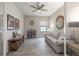 Cozy living room/study with shiplap wall, comfortable seating, and neutral color scheme at 12652 Shetland Walk Dr, Lithia, FL 33547