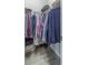Spacious walk-in closet with custom shelving and ample storage for clothing at 12652 Shetland Walk Dr, Lithia, FL 33547