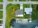 Aerial view of home with waterfront access and private dock at 13931 King Ave, Hudson, FL 34667
