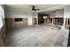 Open-concept living room with tile flooring ready for remodeling at 13931 King Ave, Hudson, FL 34667