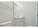 Bathroom featuring a single vanity, white cabinets and fixtures at 1583 Running Tide Pl, Sarasota, FL 34240