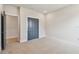 Bright bedroom features neutral carpet, double door closet, and ample natural light at 1583 Running Tide Pl, Sarasota, FL 34240