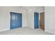 Bedroom with carpet flooring, large closets with blue doors at 1583 Running Tide Pl, Sarasota, FL 34240