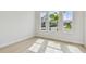 Bright bedroom with 3 windows at 1583 Running Tide Pl, Sarasota, FL 34240