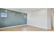 Bedroom with wood floors, recessed lighting, and blue accent wall at 1583 Running Tide Pl, Sarasota, FL 34240