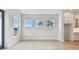 Bright living room with 3 windows at 1583 Running Tide Pl, Sarasota, FL 34240