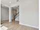 Open concept living room with stairs at 1583 Running Tide Pl, Sarasota, FL 34240