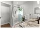 Bathroom with a walk-in shower, dual sinks, and contemporary fixtures at 1631 Shady Oaks Dr, Oldsmar, FL 34677