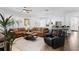 Bright and airy living room boasts an open layout, modern furnishings, and natural light at 1631 Shady Oaks Dr, Oldsmar, FL 34677