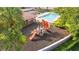 Community playground and pool area, perfect for Gathering fun and relaxation at 1631 Shady Oaks Dr, Oldsmar, FL 34677