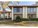 Exterior angle of a condo with a tile roof, showing lots of natural light at 1712 Hammock Pine Blvd # 1712, Clearwater, FL 33761