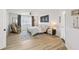 Spacious bedroom featuring a ceiling fan, a massage chair and a moon phases art piece at 1802 Regal Mist Loop, Trinity, FL 34655