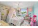 Charming bedroom featuring unique canopy bed and whimsical décor at 1802 Regal Mist Loop, Trinity, FL 34655