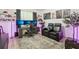Modern home office with multiple monitors, comfortable seating, and stylish decor for productivity at 1802 Regal Mist Loop, Trinity, FL 34655