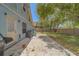 This backyard features a travertine patio, well-maintained fence, and plenty of space for outdoor living at 1830 Springwood N Cir, Clearwater, FL 33763