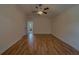 Expansive bedroom with vaulted ceilings and wood-look flooring at 1830 Springwood N Cir, Clearwater, FL 33763