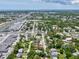 An aerial view of a home situated in a community with close proximity to the local businesses at 1843 Berg Rd, Holiday, FL 34690