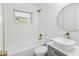 Beautiful bathroom featuring modern fixtures, a stylish vanity, and a shower-tub combo at 1843 Berg Rd, Holiday, FL 34690