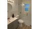 Modern bathroom with glass-enclosed shower, stylish vanity, and contemporary fixtures at 1913 W Saint Conrad St, Tampa, FL 33607