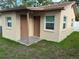 Close-up of exterior of small building with 2 doors at 1913 W Saint Conrad St, Tampa, FL 33607