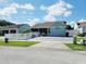 Charming single-story home featuring a well-maintained lawn and driveway at 1918 Crown Park Dr, Valrico, FL 33594