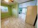 Living space featuring marble tile floor, overhead fan, with access to a backyard patio at 1918 Crown Park Dr, Valrico, FL 33594