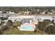 Aerial view of community clubhouse with pool, common areas, and surrounding neighborhood at 1921 58Th N Ave # 15, St Petersburg, FL 33714