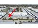 Aerial view of condo building complex, showing surrounding landscaping, streets and parking at 1921 58Th N Ave # 15, St Petersburg, FL 33714