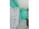 This stylish bathroom features an updated shower with tile surround and modern fixtures at 2609 Sunnyside Cir, Palm Harbor, FL 34684