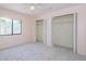 Light and airy bedroom with neutral carpet and a large window for natural light at 2609 Sunnyside Cir, Palm Harbor, FL 34684