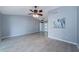 Open concept living area with ceramic tile flooring, ceiling fan, and recessed lighting at 2609 Sunnyside Cir, Palm Harbor, FL 34684